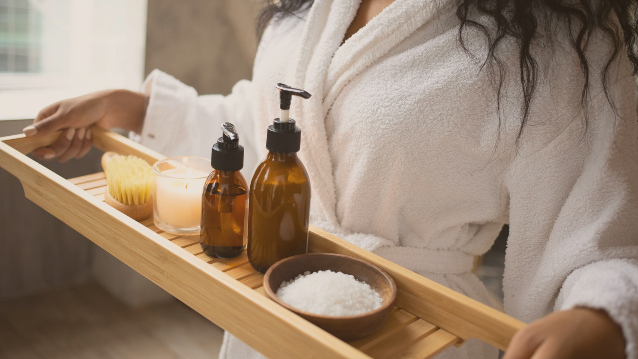 black-woman-holding-bath-tray-tapping-into-feminine-energy-for-fertility